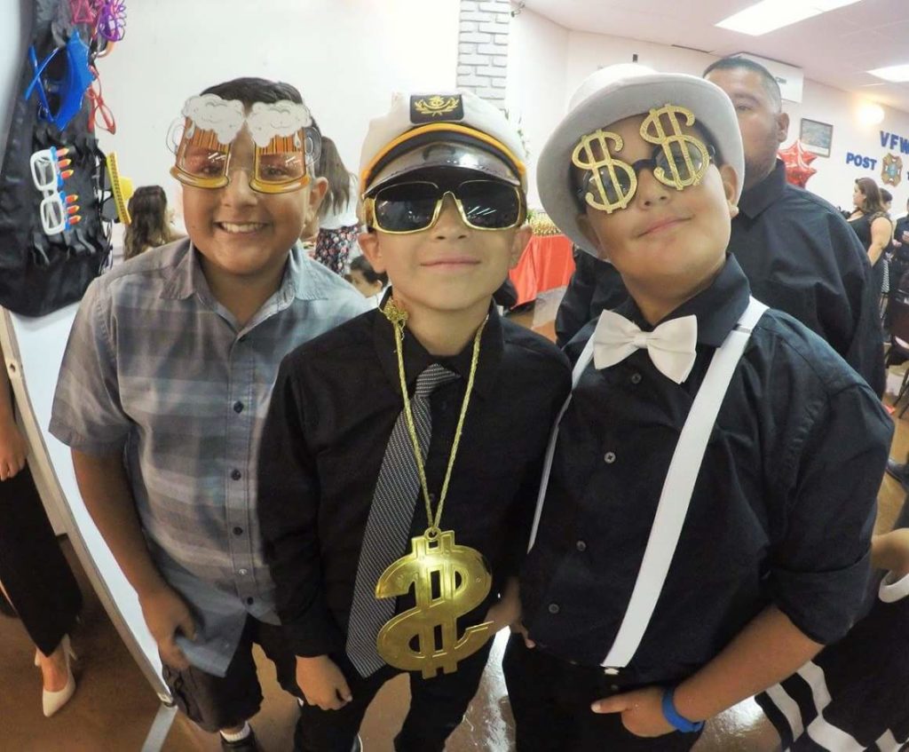 a picture of kids showing that photo booth rentals in Orange County are for all ages